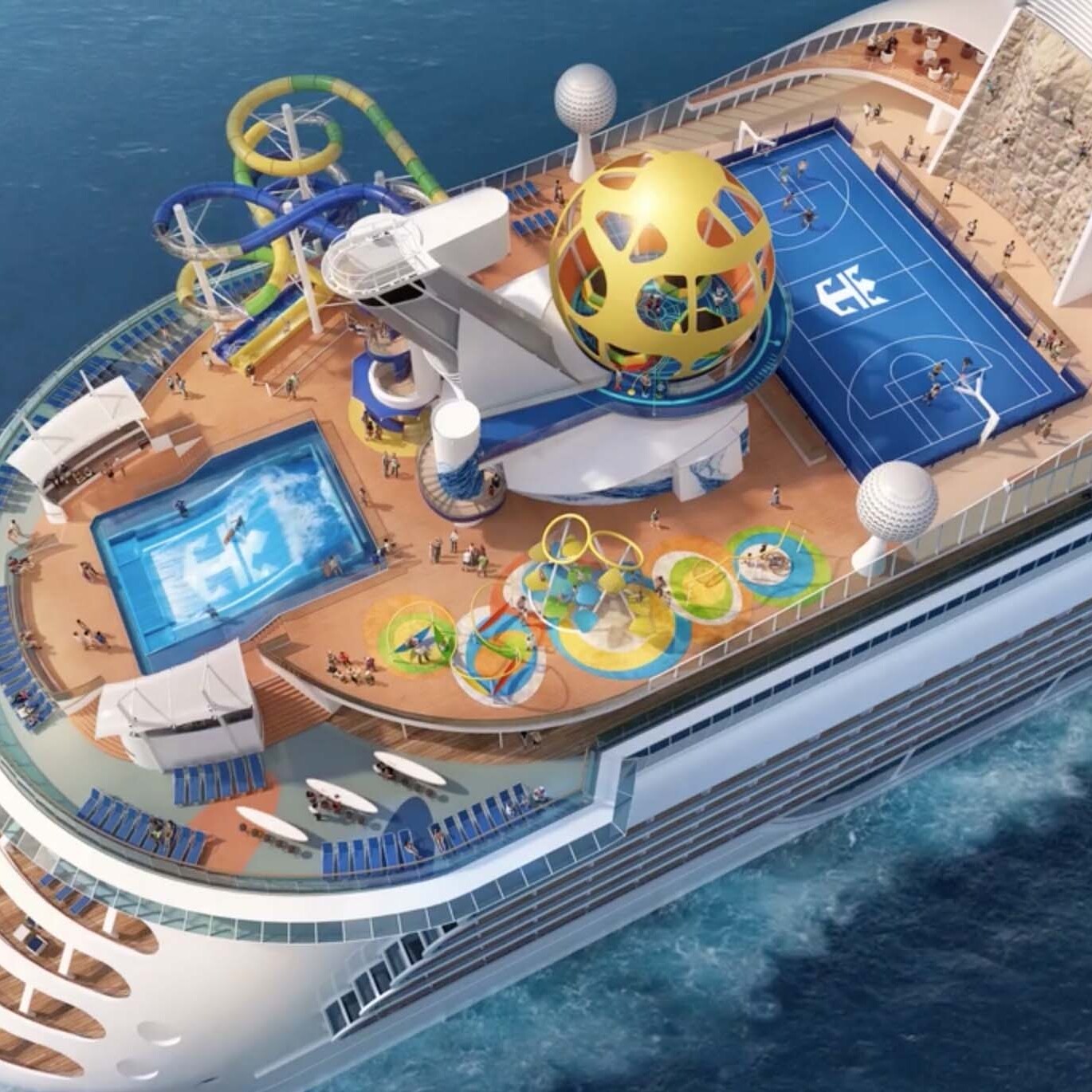 A cruise ship with a pool and slide on the deck.