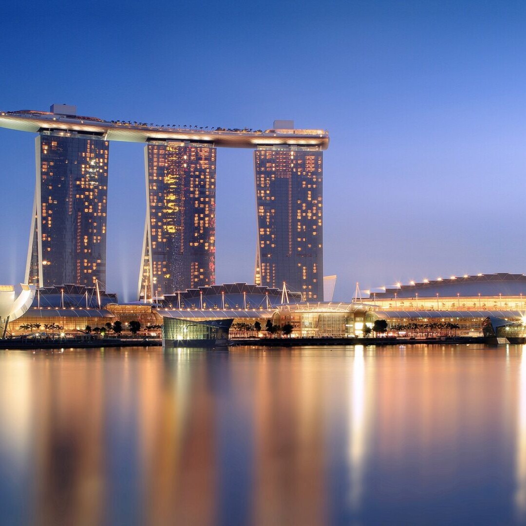 A view of the marina bay sands resort from across the river.