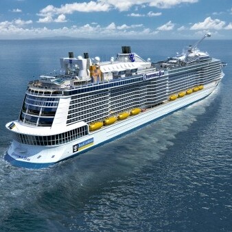 A large cruise ship floating on top of the ocean.